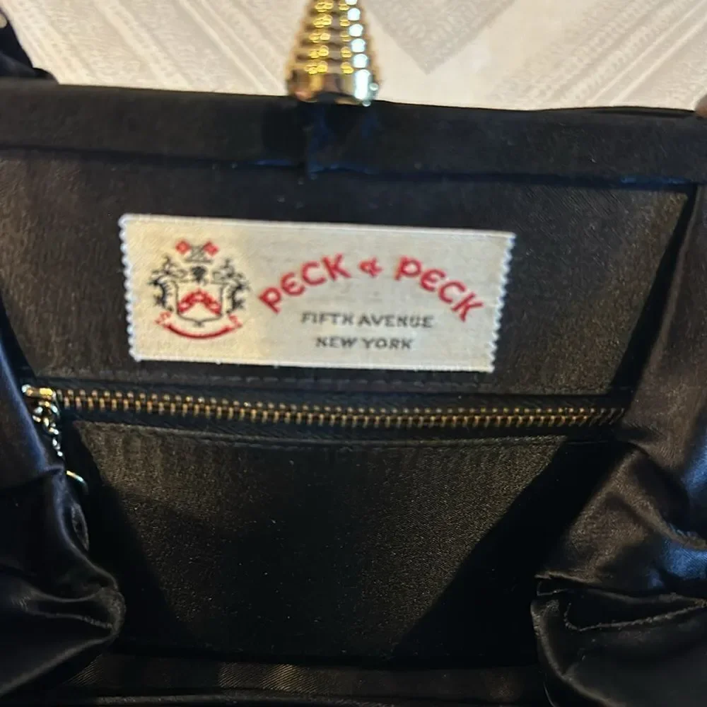 Peck & Peck peck black
